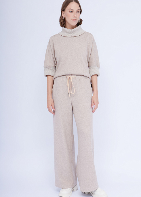 Брюки из мягкого трикотажа женские, цвет бежевый 